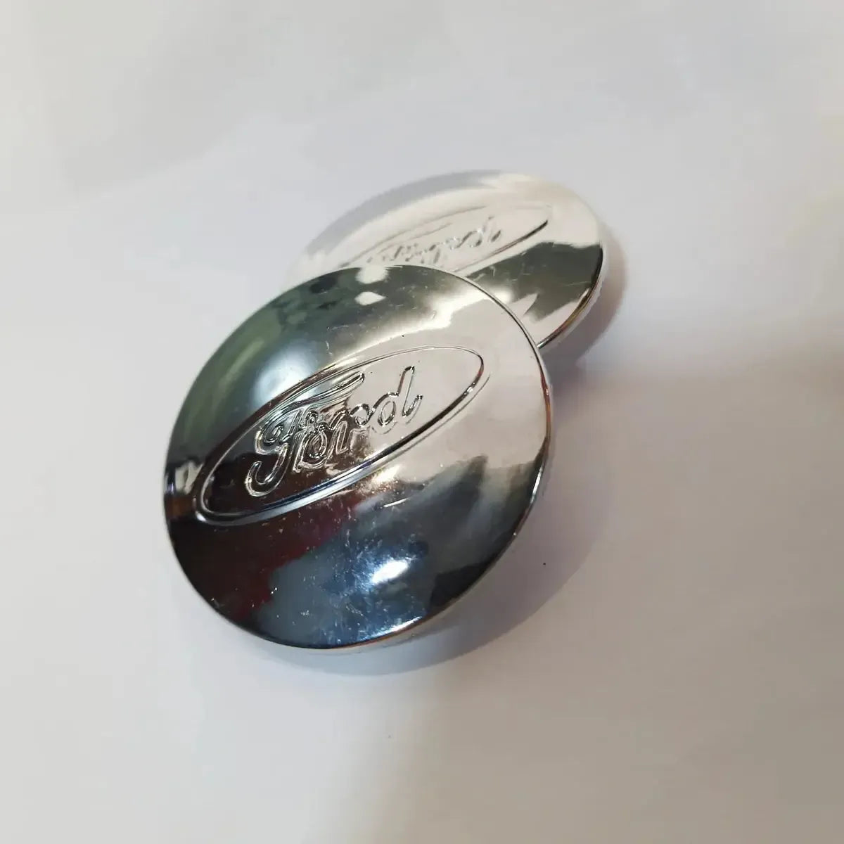 FORD WHEEL CENTER CAP SILVER 58MM - CAR by FORD | Buy Online at VROOMPARTSSHOP